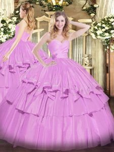 Clásico lila sin mangas hasta el suelo con cuentas y capas con volantes en los vestidos de quinceañera
