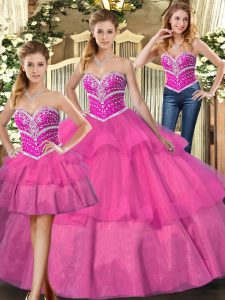 Brillante largo de largo sin mangas con cordones hasta 15 vestidos de quinceañera en color lila con abalorios y capas con volantes
