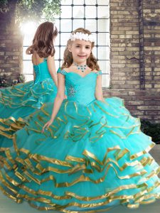 Diseñar a medida rebordeando y frunciendo el vestido del desfile de las niñas al por mayor aqua azul con cordones hasta el suelo sin mangas